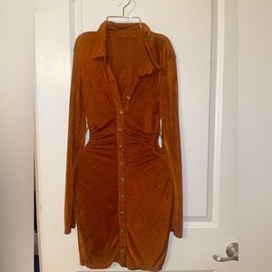 Shinny Brown dress. Size small. Open from the sides.